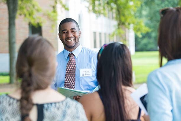 Campus tour guide with students